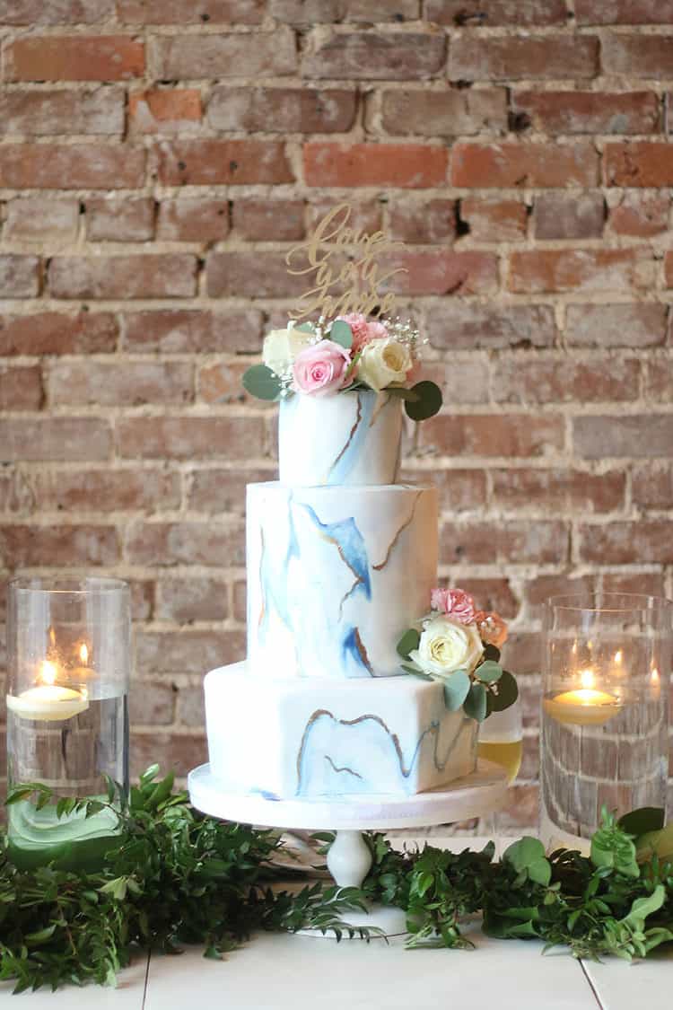 This Marbled Fondant Wedding Cake with Navy, Gold and Pink 