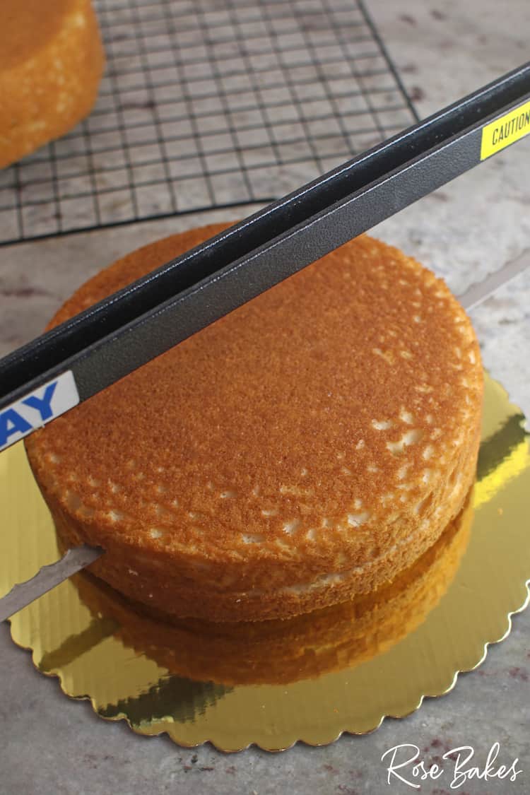 using an Agbay cake leveler to torte a layer of vanilla cake