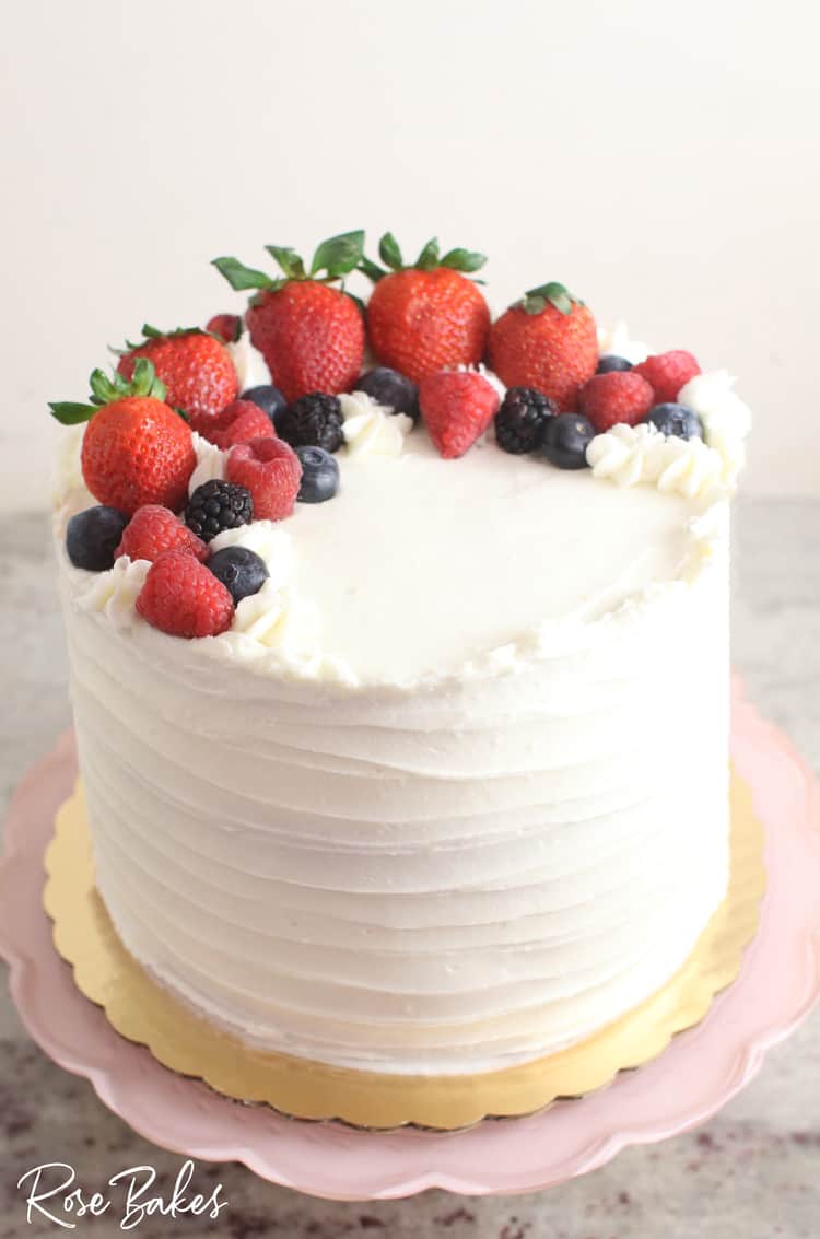 Chantilly cake with textured buttercream and fresh berries on top