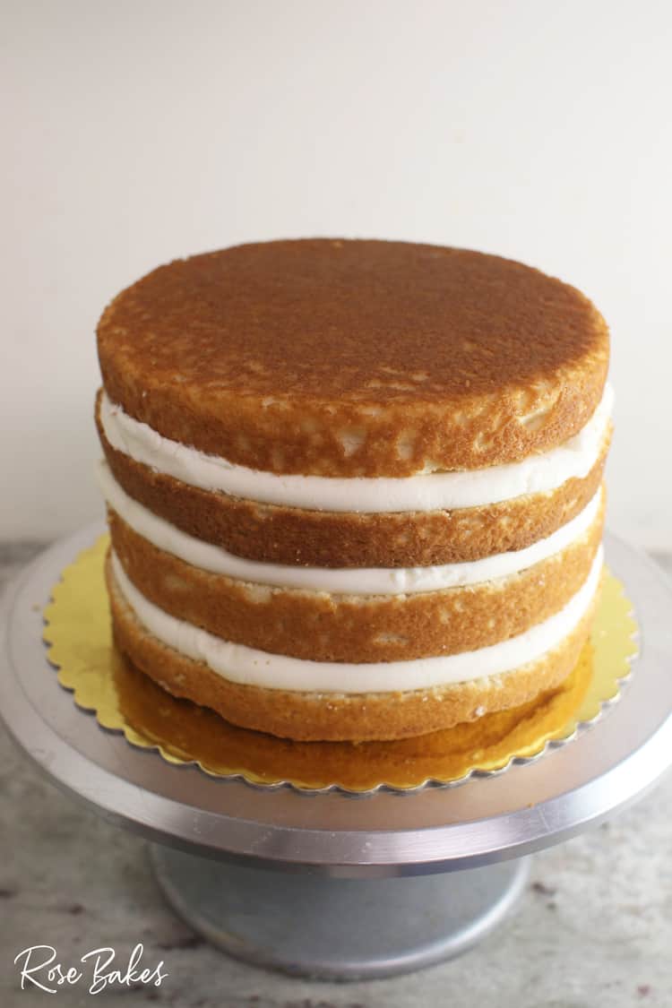 stacked layers of cake with buttercream between