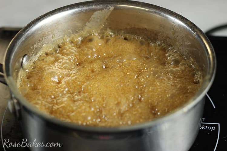 Caramel sauce boiling in a sauce pan