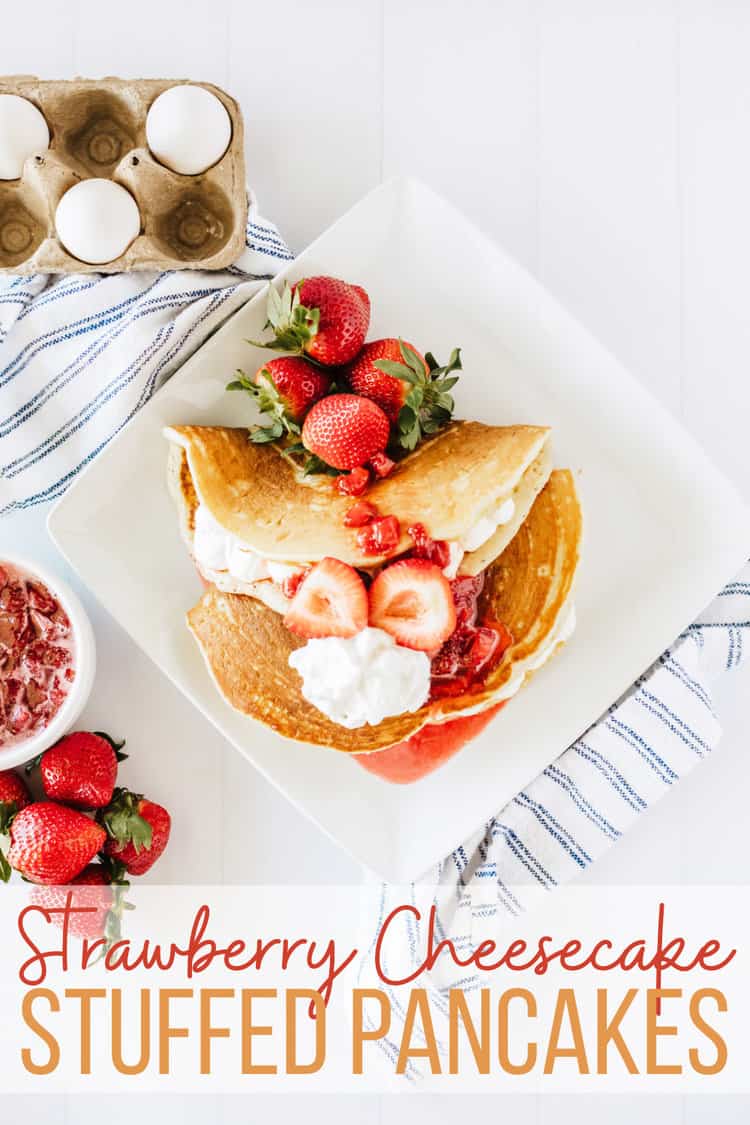 Strawberry Cheesecake Pancakes on a plate with text overlay