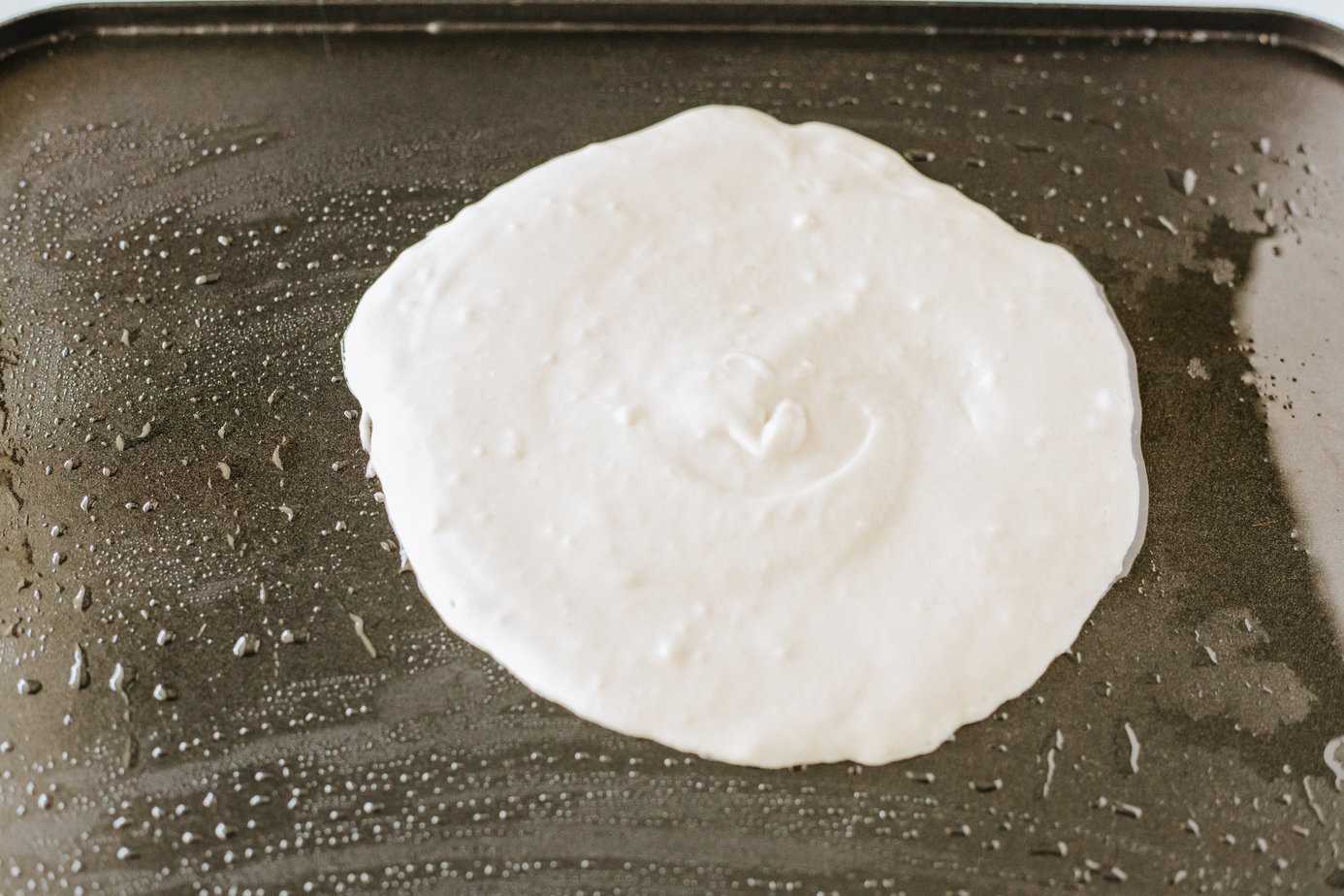 pancake batter on a griddle