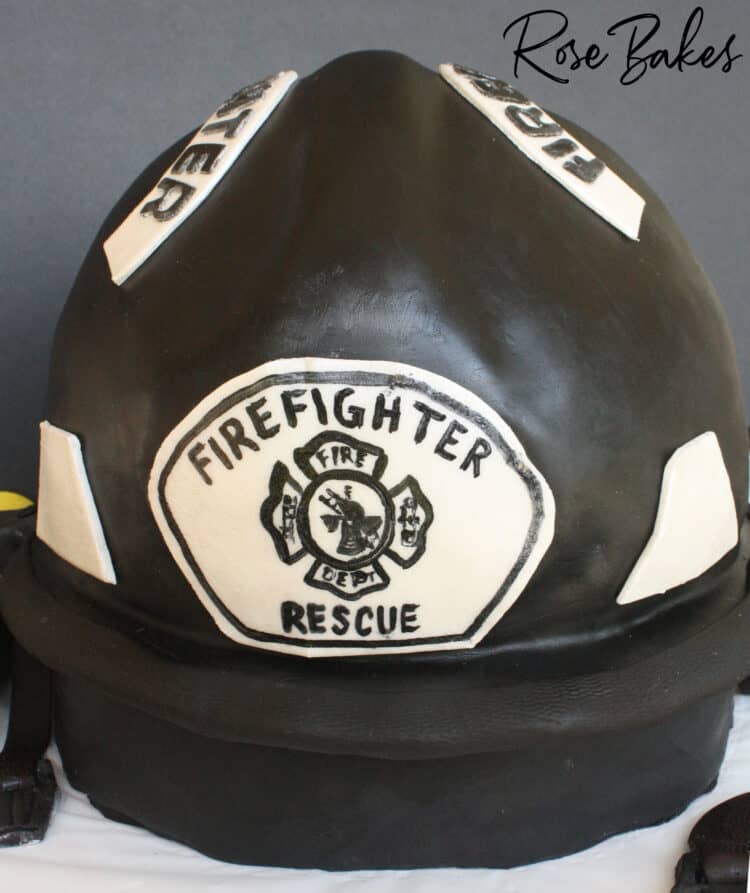 "Firefighter Rescue" painted on the front of the helmet 