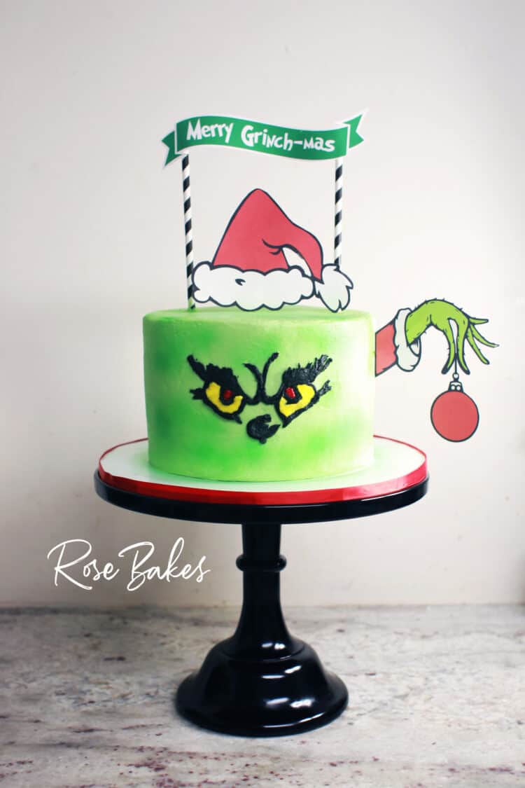 Grinch Cake with banner topper "Merry Grinch-mas"
