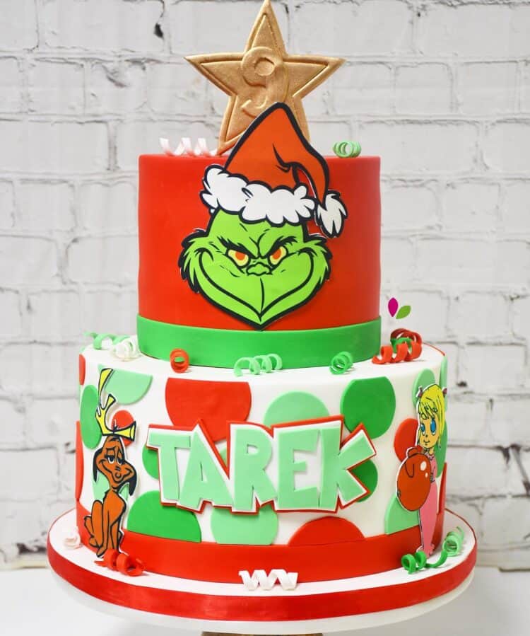 2 tier grinch cake with Whoville designs by Pastry is Art