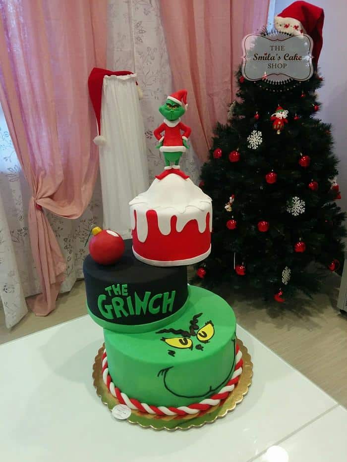 wonky christmas cake with grinch topper by Smila's Bake Shop
