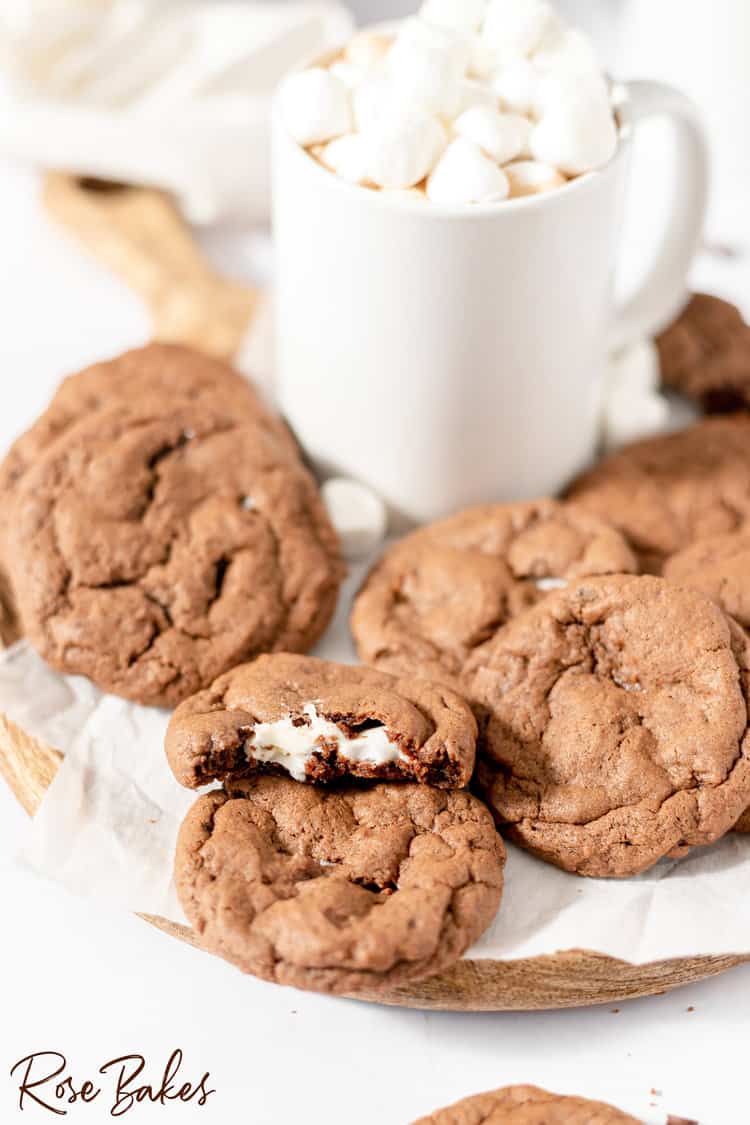 Hot Chocolate Cookies next to hot chocolate in white cup with marshmallows 