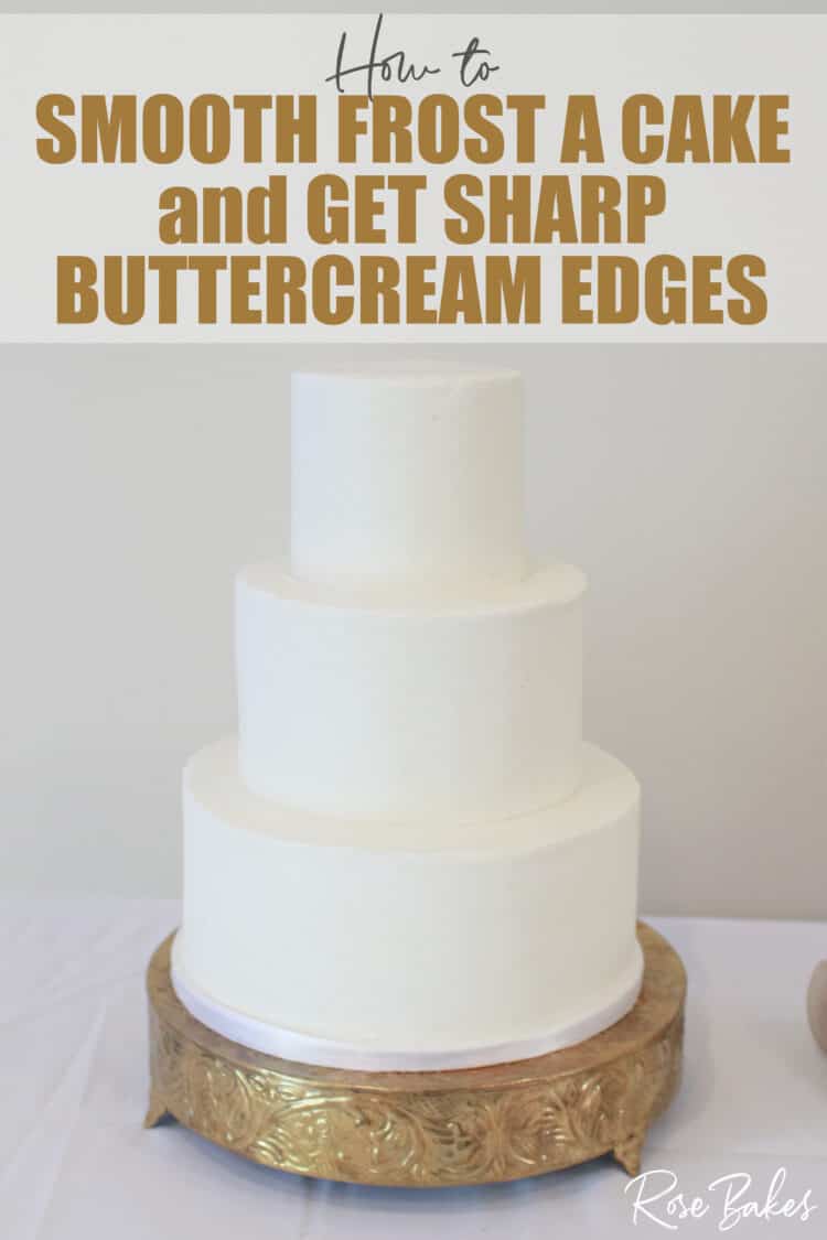 crisp white buttercream 3 tier cake on gold cake stand with sharp edges  with title how to smooth frost a cake and get sharp buttercream edges