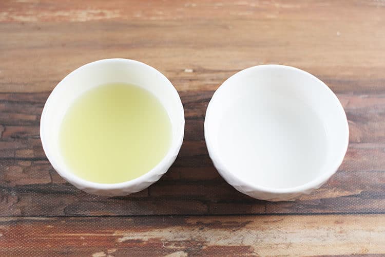 lemon juice and white vinegar in small white bowls