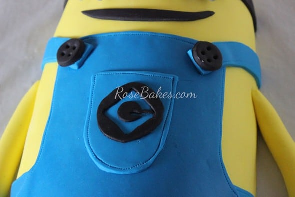 Minion Cake overalls upclose showing