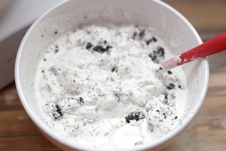soft homemade oreo cookies and cream ice cream in white bowl before frozen