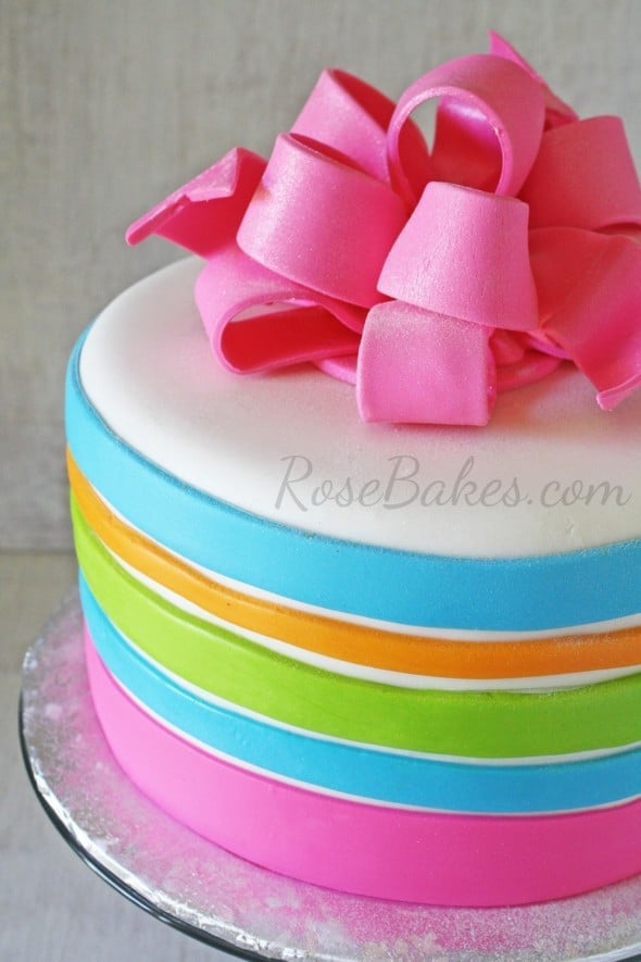 Neon Stripes Birthday Cake with Hot Pink Sparkly Bow