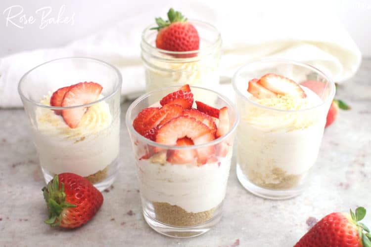No-Bake Cheesecake Cups Recipe in cups with strawberries on top