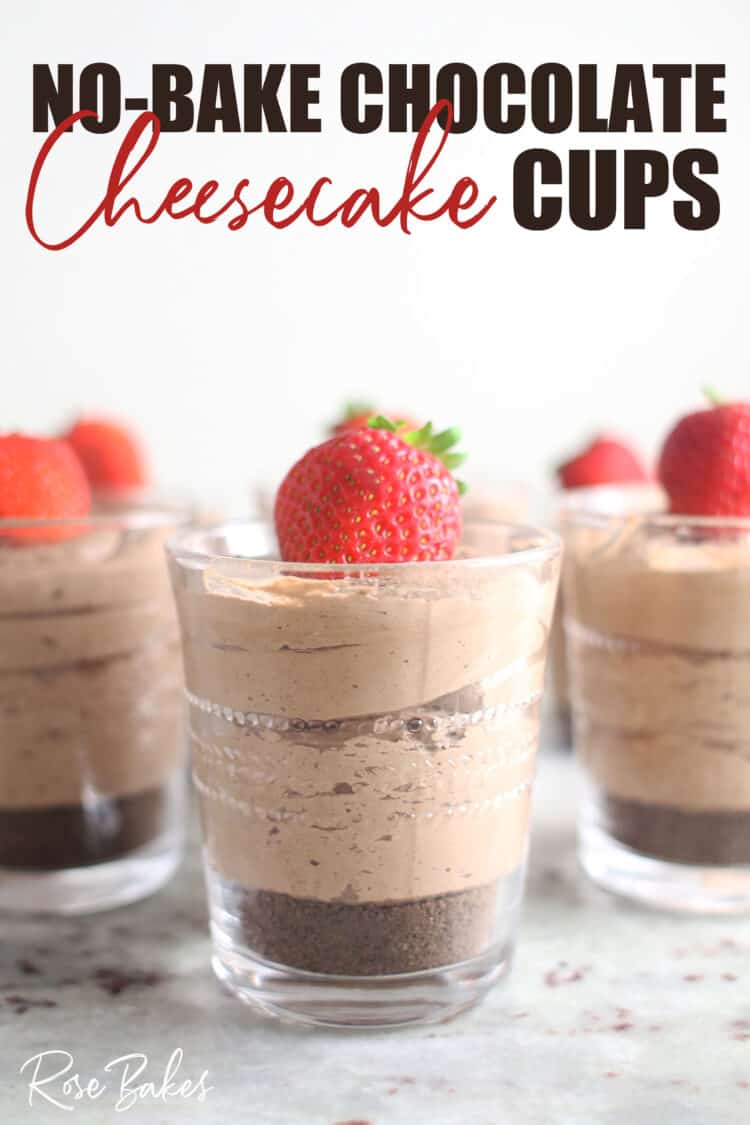 Creamy No-Bake Chocolate Cheesecake Cup in small clearglass with cookie crust and topped with strawberry