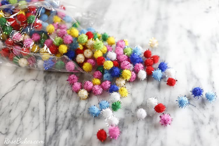 mixed bag of colorful pompoms