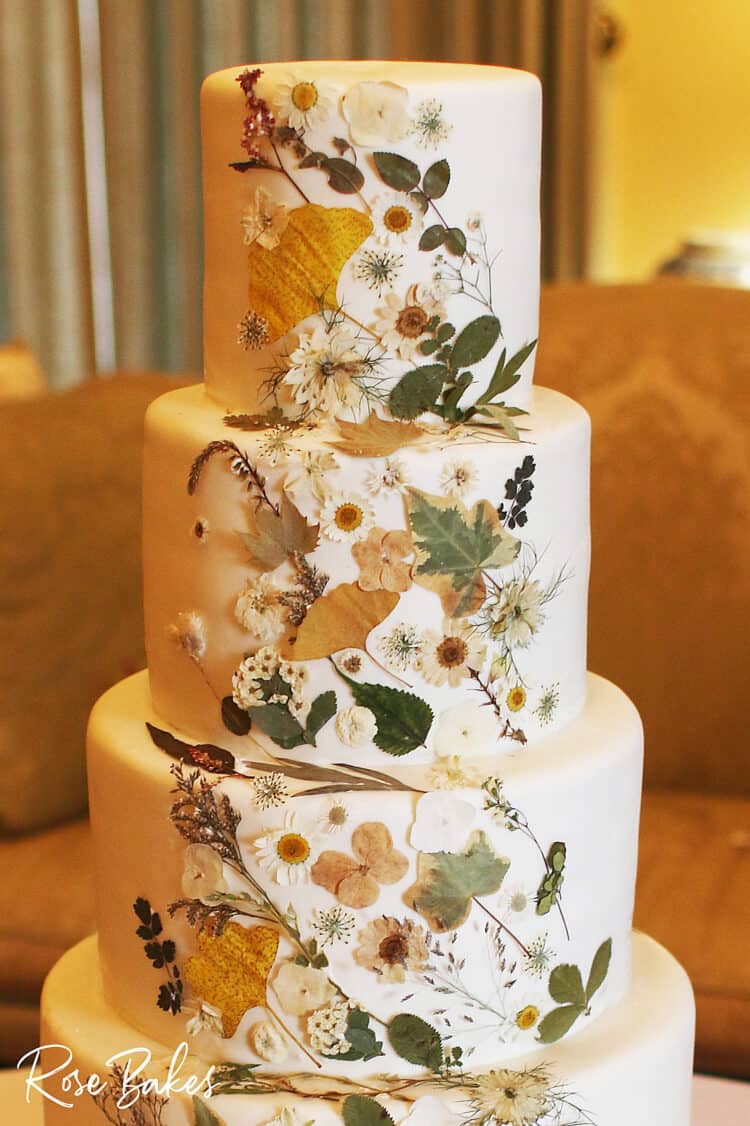 pressed flowers on a wedding cake