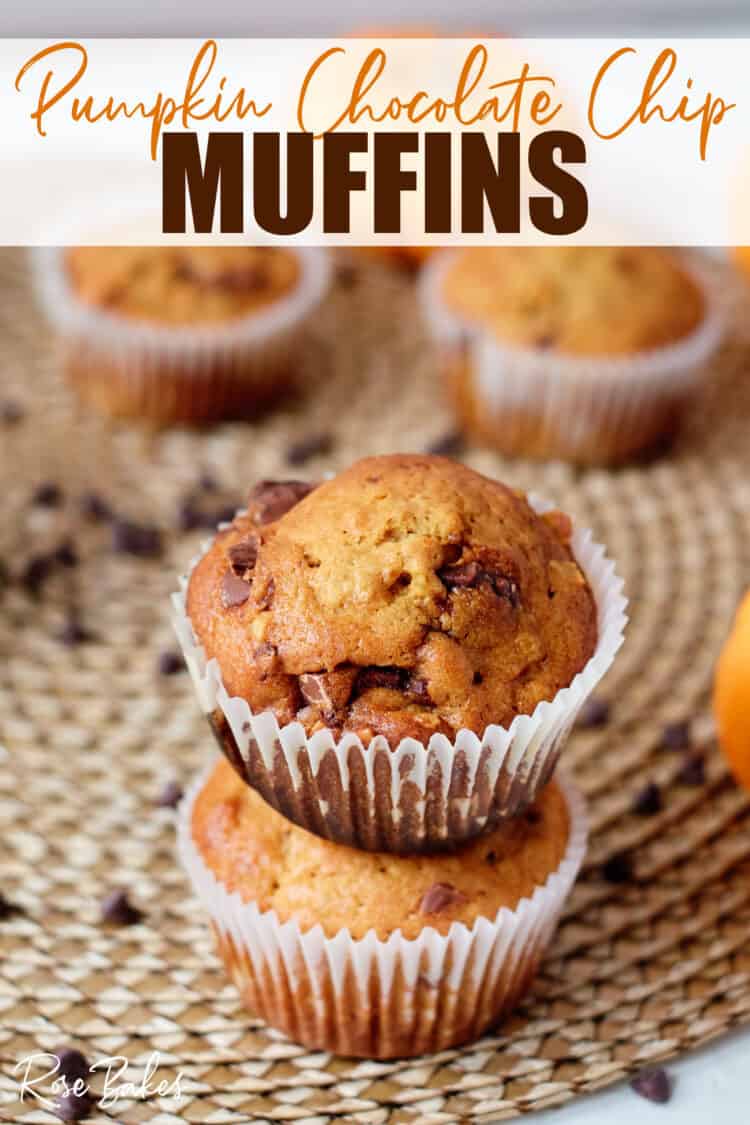 A couple of muffins stacked with chocolate chips scattered around on the table.  Text at the top of the image reads Pumpkin Chocolate Chip Muffins