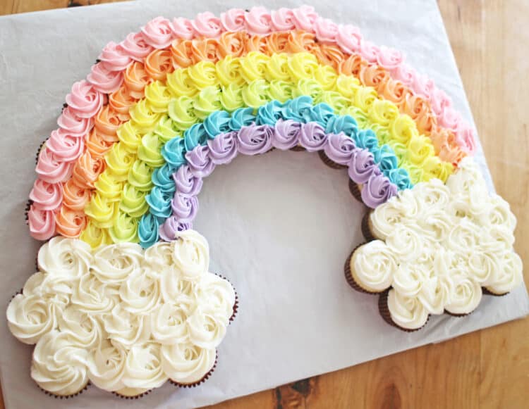 rainbow cupcake pullapart cake on white serving trays 