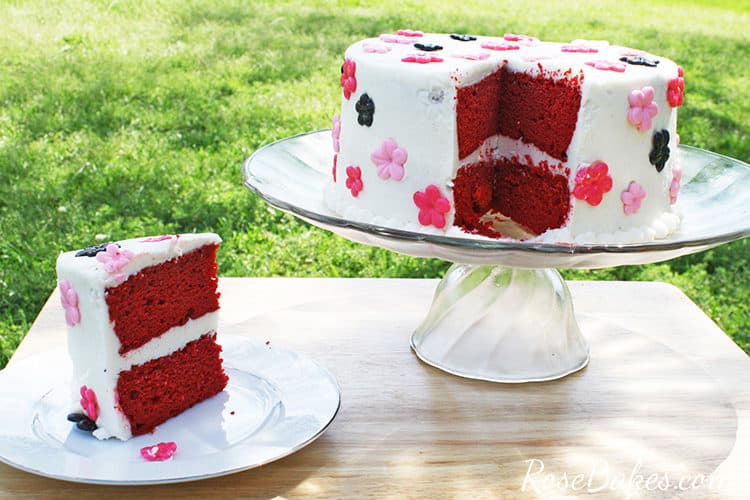 sliced red velvet cake on a cake stand