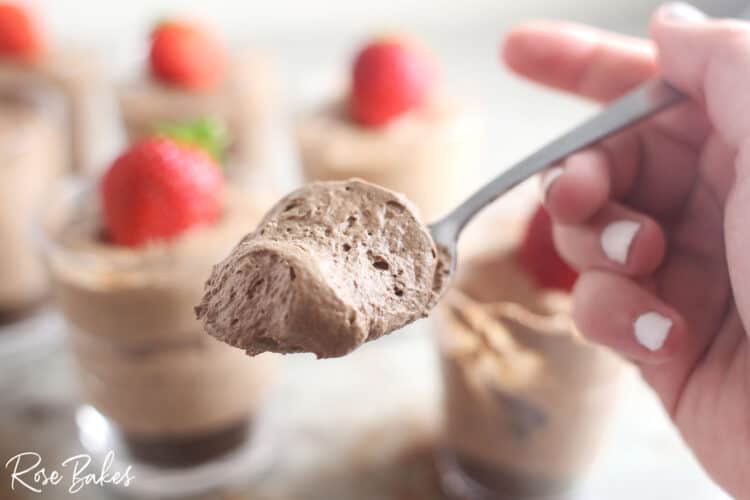 a spoonful of no bake chocolate cheesecake cup