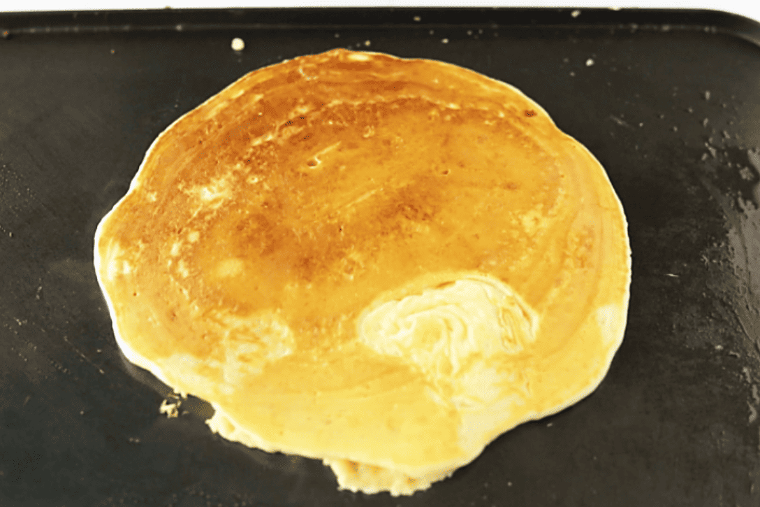 cooked pancake on a griddle