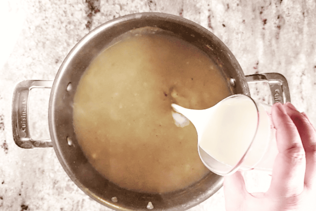adding heavy cream to potato soup